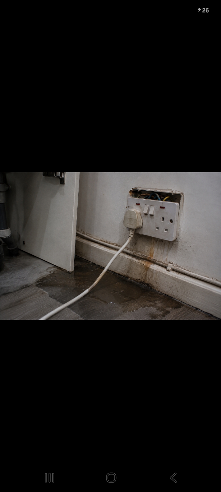 Damaged electrical socket needing urgent repair